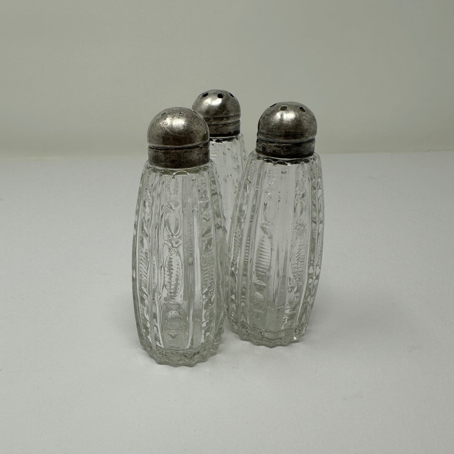 Vintage salt and pepper shakers trio